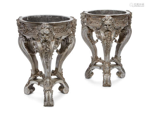 A pair of Baroque style silvered mixed metal jardinières