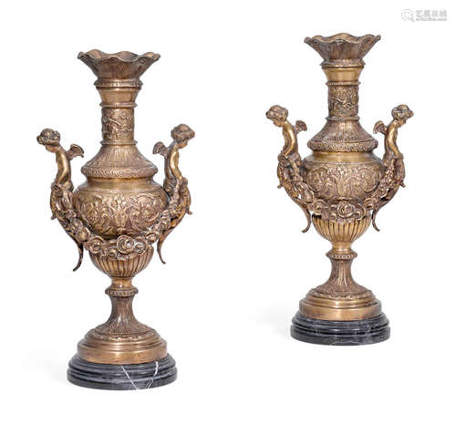 A pair of Louis XVI style bronze and marble vases