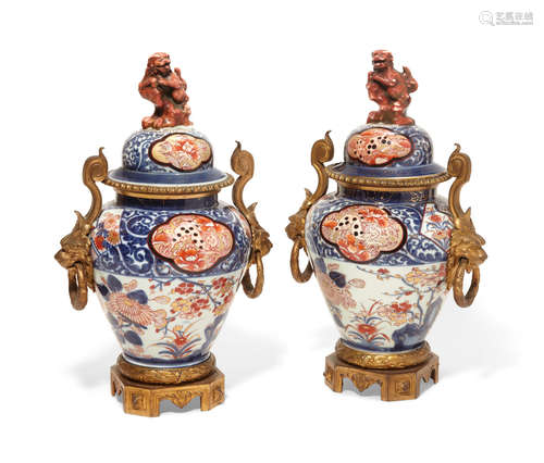 19th century A pair of Louis XVI style gilt bronze mounted Imari porcelain covered jars