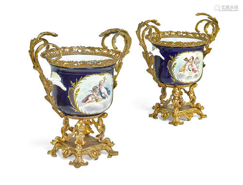 19th century A pair of gilt bronze mounted Sèvres style porcelain two handled cache pots