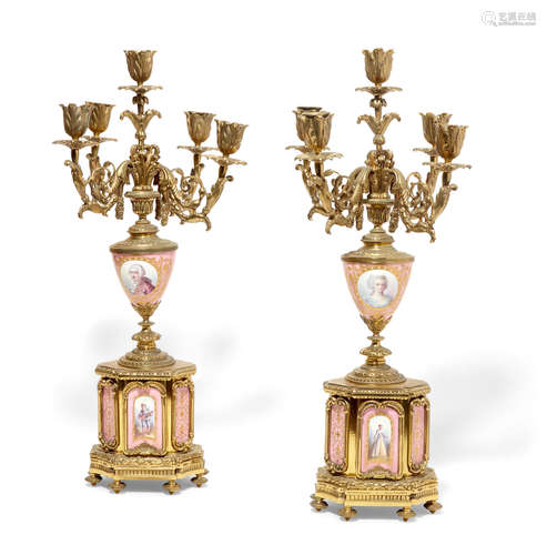 A Pair of Sèvres style gilt bronze mounted jeweled porcelain five light candelabra