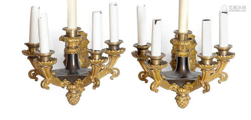 19th century A pair of Charles X style gilt and patinated bronze five light bras de lumière