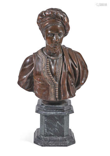 A patinated bronze bust of a man