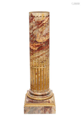 A Neoclassical style gilt bronze mounted fluted marble pedestal