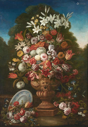 An opulent floral still life in a garden urn; also a companion painting (a pair) each 71 x 50in (180.4 x 127cm) Circle of Giacomo Nani(Port'Ercole 1698-1770 Naples)