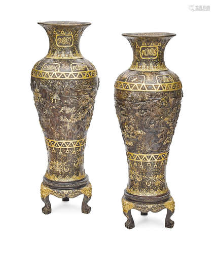 A pair of impressive Chinese patinated bronze vases on stands