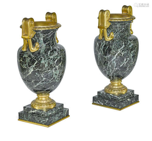 Late 19th century A pair of Empire style gilt bronze mounted verde antico marble swan head two handled urns