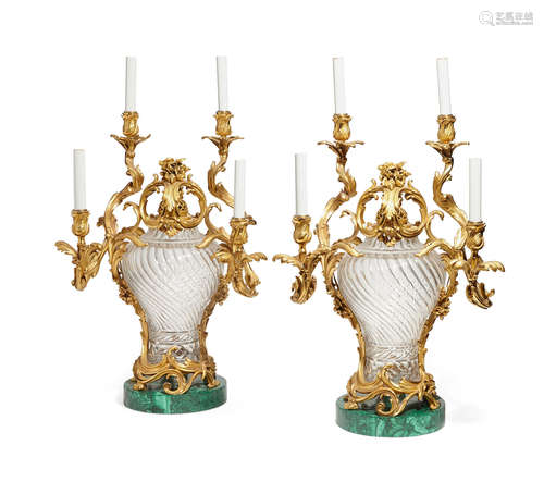 A pair of Louis XV style gilt bronze and glass four light candelabra