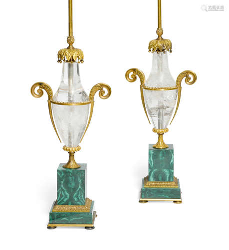 A pair of Empire style gilt bronze, rock crystal and malachite veneered urn form lamps