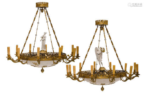 20th century A pair of Empire style gilt and patinated bronze and painted twelve light chandeliers