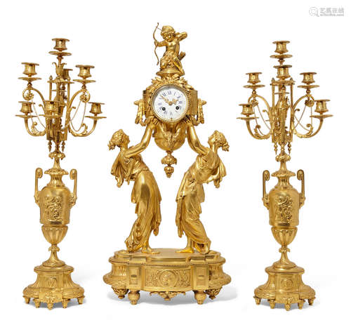 By Lemerle-Charpentier & CieSecond half 19th century A Napoleon III gilt bronze three piece clock garniture