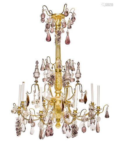 A Neoclassical style giltwood and gilt brass rock crystal and amethyst eight light chandelier