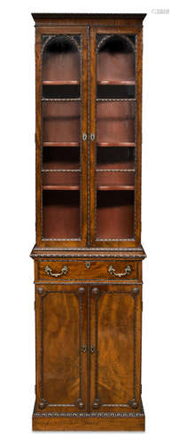 Incorporating antique elements A diminutive George II/III carved mahogany bookcase