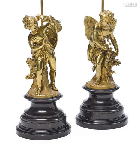 Late 19th century A pair of Louis XVI style gilt bronze figures raised on polished black slate plinths: Cupid & Psyche