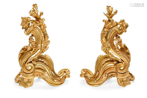 Late 19th century A pair of French Louis XV style gilt bronze chenets