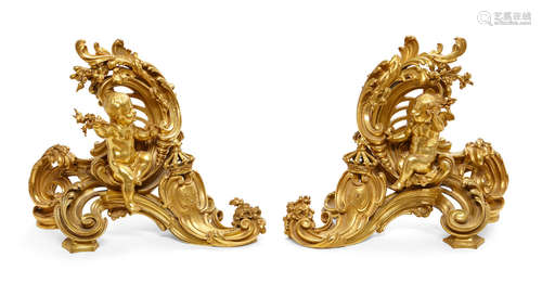 Late 19th century A pair of Louis XV style gilt bronze chenets