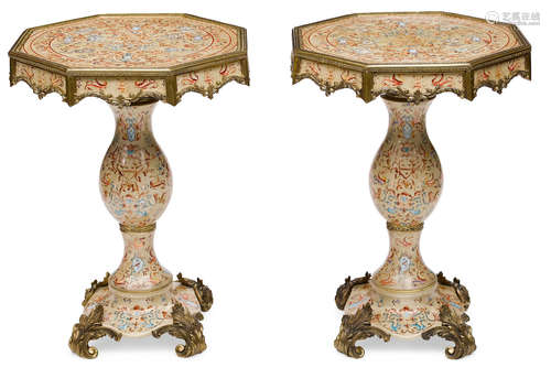 A pair of Baroque style polychrome ceramic and bronze mounted tables