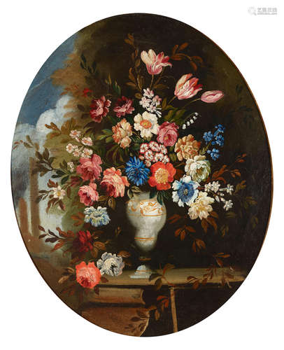 An oppulent still life of flowers in a vase; also a companion painting (a pair) each 32 1/2 x 25 1/2in (82.6 x 64.9cm) Continental School