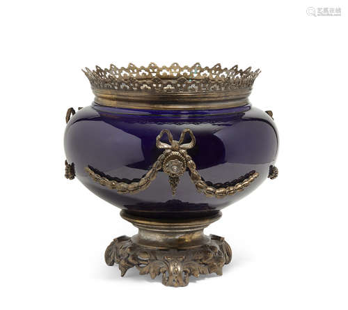 Circa 1900 A Continental silvered bronze and glazed earthenware jardinière