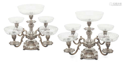 by Reed & Barton, Taunton, MA 20th century  A pair of American silverplate five-light candelabra