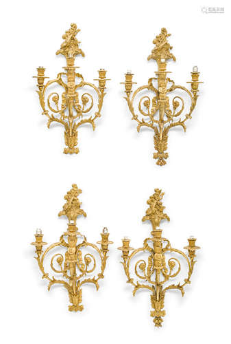 Late 19th century A Fine Set of four Louis XVI style gilt bronze three light bras de lumière