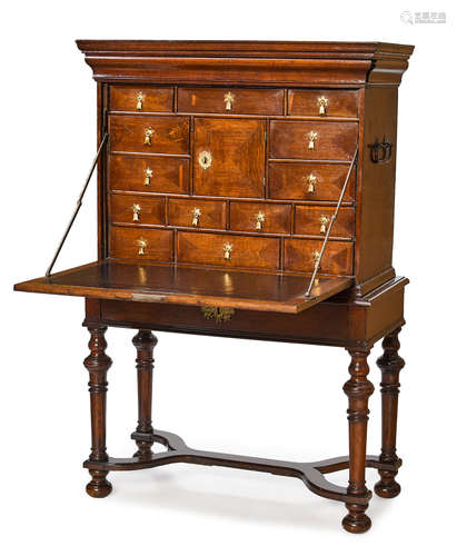 Late 17th century and later A Continental Baroque oak fall front secretaire cabinet on stand