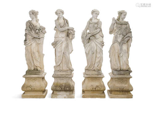 A set of four carved stone figures in the Baroque taste representing the seasons