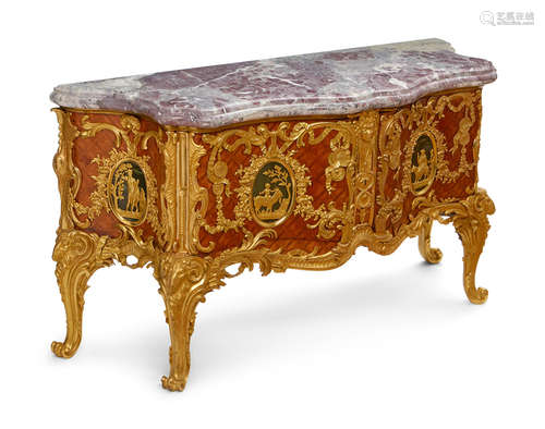 After the model by Antoine-Robert Gaudreau made for the Cabinet du Roi A Régence style gilt bronze mounted parquetry and horn commode