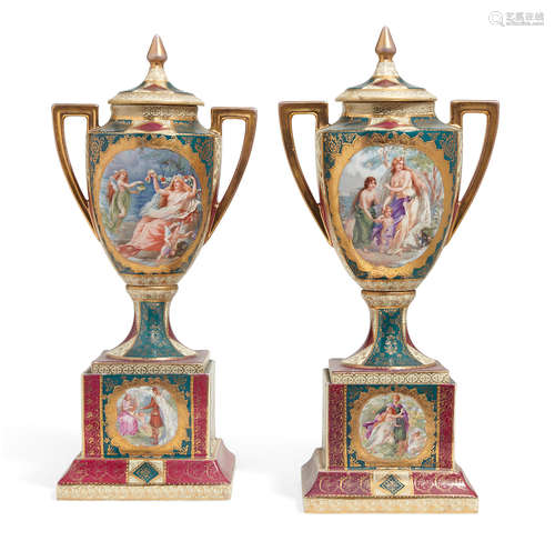 A pair of Austrian porcelain Neoclassical style covered urns