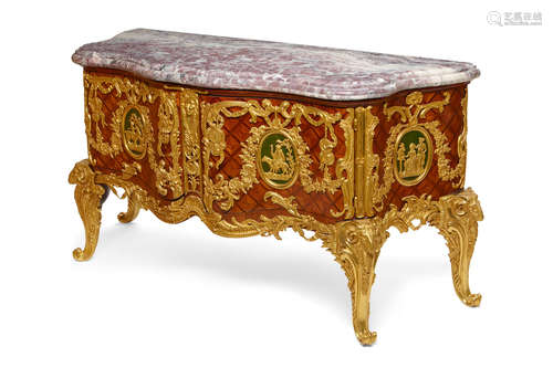 After the model by Antoine-Robert Gaudreau made for the Cabinet du Roi A Régence style gilt bronze mounted parquetry and horn commode