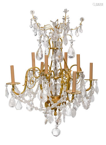 A French gilt bronze and rock crystal eight light chandelier