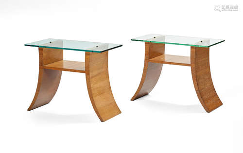 Circa 1940height 21 3/4in (55.2cm); width 28in (71cm); depth 14in (35.5cm)  A pair of James Mont limed oak and glass side tables