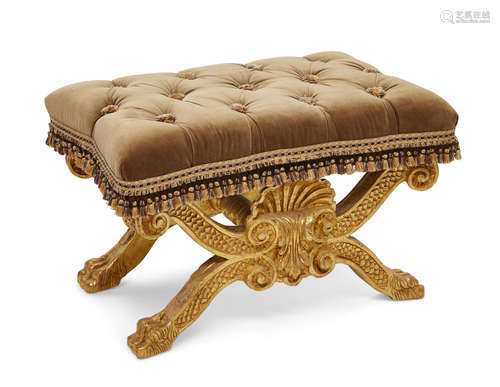 An Italian Baroque style giltwood X-framed stool