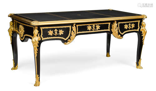 Late 19th century A Louis XV style gilt bronze mounted ebonized bureau plat