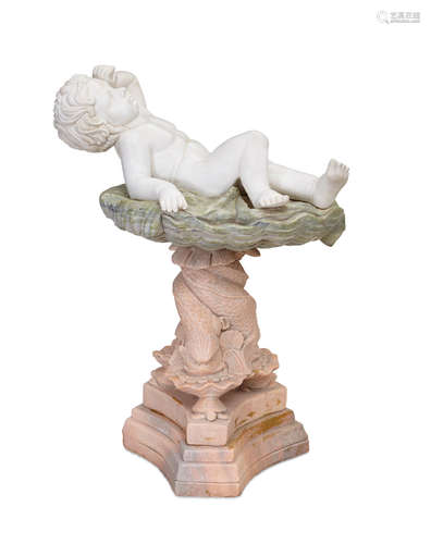 A Baroque style carved white marble figure of a child in a basin