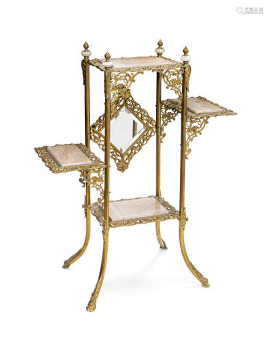 A Continental gilt metal and marble four tier étagère