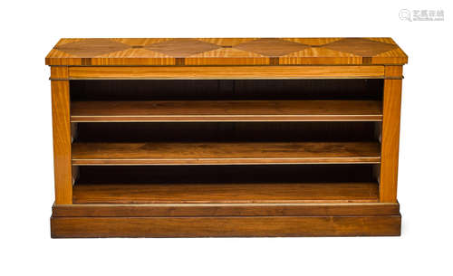 A Chester Jones brass mounted satinwood and walnut low bookcase