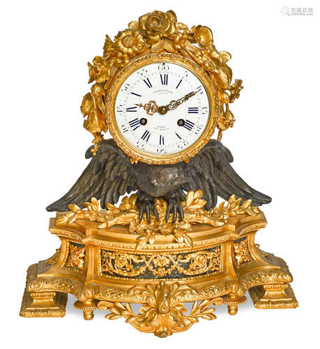 Third quarter 19th century  A Napoleon III gilt and patinated bronze and verde antico marble inset mantel clock