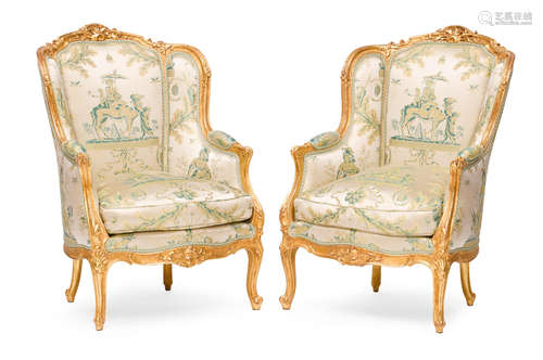 20th century A pair of Louis XV style carved giltwood bergères