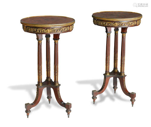 Circa 1900 A pair of French gilt bronze mounted parquetry inlaid mahogany occasional tables