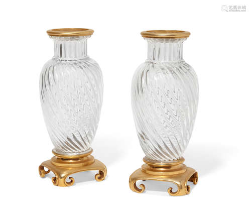 A pair of Continental gilt bronze mounted writhen glass vases