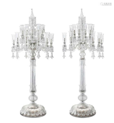 In the manner of Baccarat An impressive pair of cut glass twenty-four light torchères