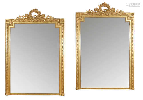 20th century A pair of Louis XVI style giltwood over mantel mirrors