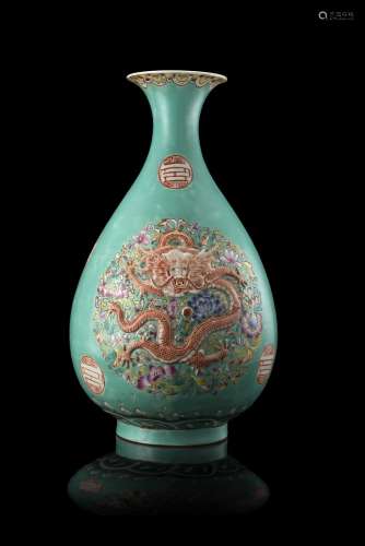 A turquoise-glazed polychrome vase, decorated in high relief with a dragon and shou characters, with