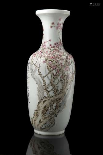 A baluster vase decorated with a flowering prunus branch with calligraphy lines and seals of the