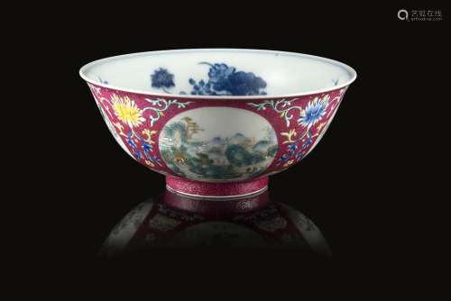A ruby-ground sgraffiato medallion bowl decorated with landscape scenes, the interior in blue and
