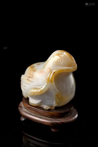 An agate carving of a quail with millet stalksChina, 19th century(h. 9 cm.)ITScultura in agata