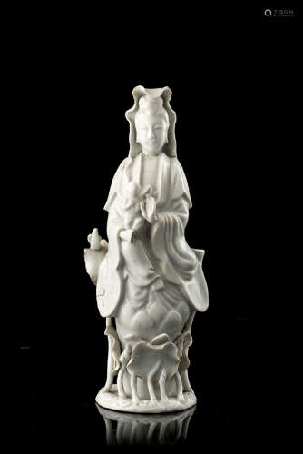 A Blanc-de-Chine model of Guanyin with a boy (defects and losses)China, early 20th century(h. 23