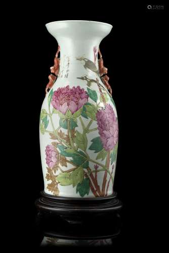 A polychrome-enamelled porcelain jar decorated with flowers and calligraphy (slight defects)China,