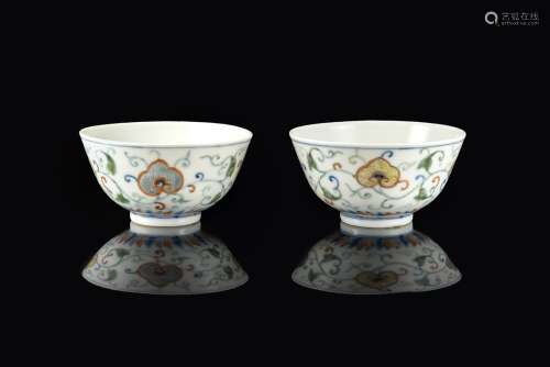 A pair of small doucai cups decorated with floral motifsChina, Guangxu mark and of the period (